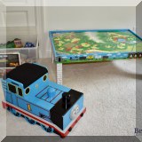 Y11. Thomas the Tank Engine toybox, train table and trains. 